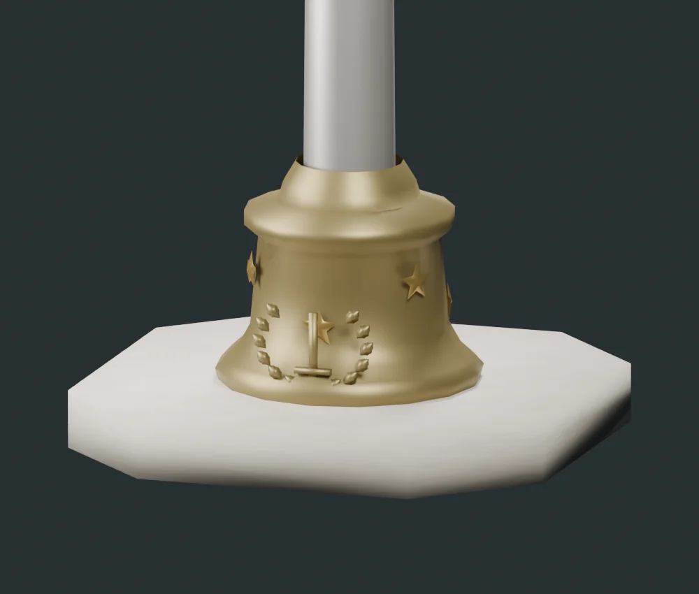 Close-up of an interpretive bronze flagpole base with stars and sword-and-wreath relief on an octagonal stone plinth.